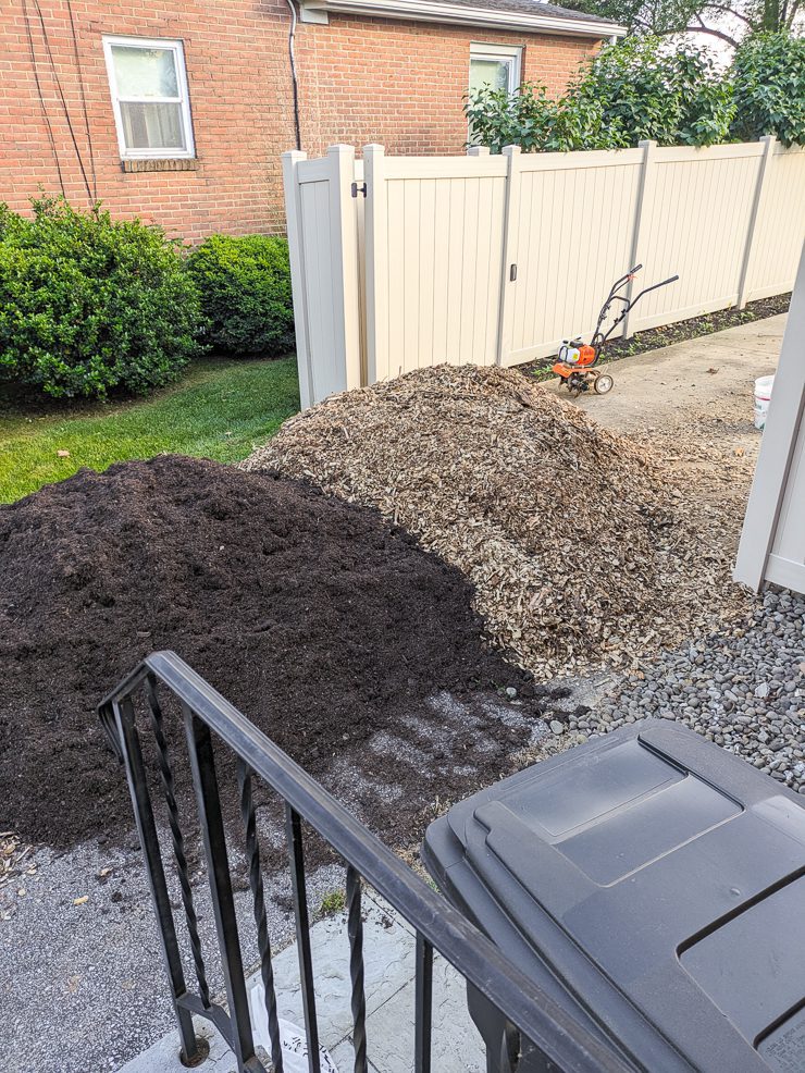 piles of compost and wood chips