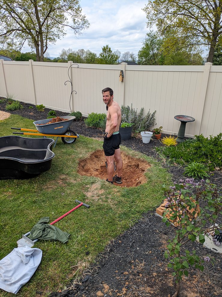 man digging a hole