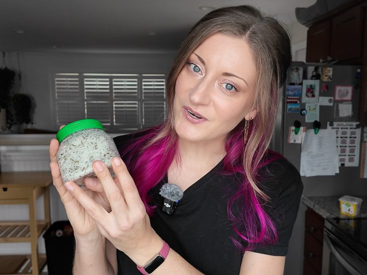 woman holding DIY salt scrub