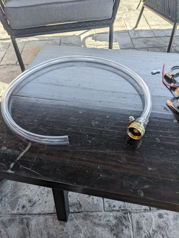 clear tube with a brass fitting on it