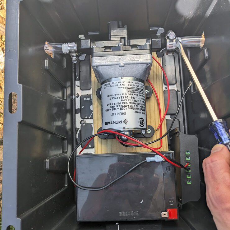 battery on a plastic utility box