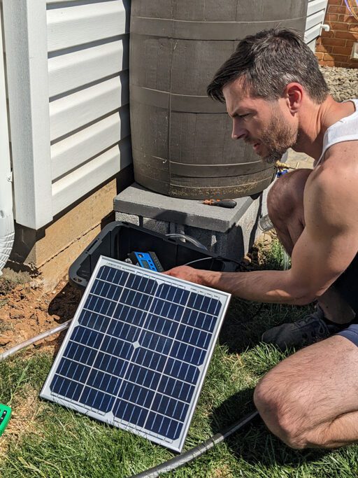 man with a solar panel