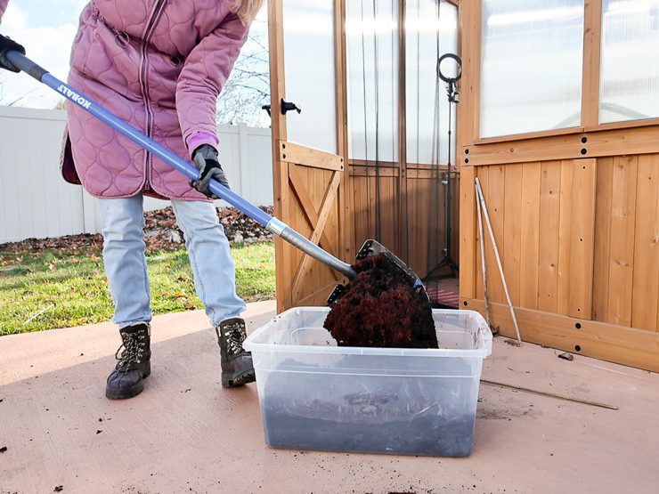 mixing homemade potting soil