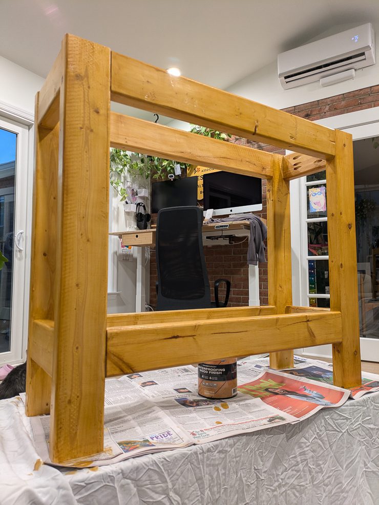 staining the frame of a table