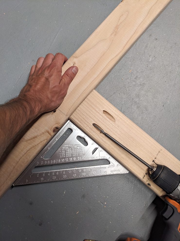 attaching two pieces of wood with a screw