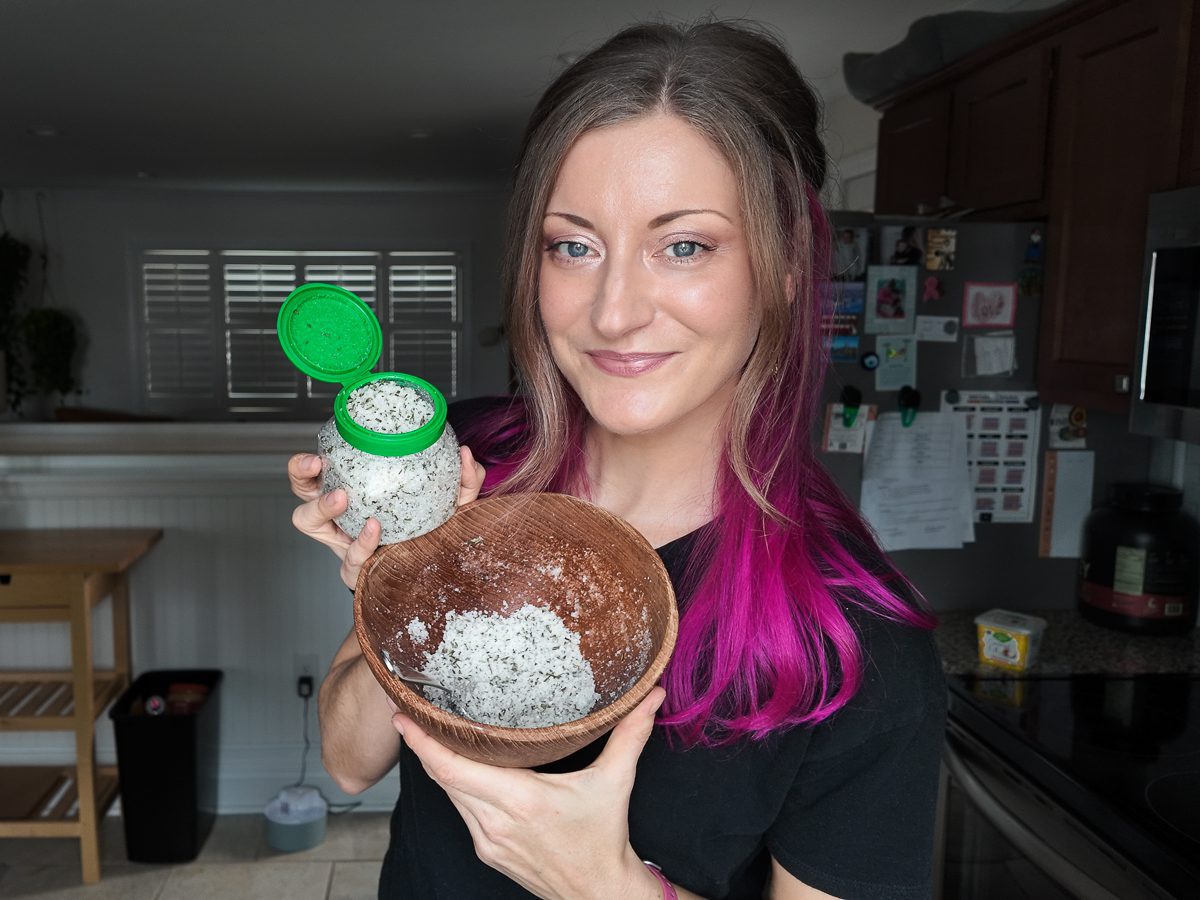 woman holding DIY salt scrubs