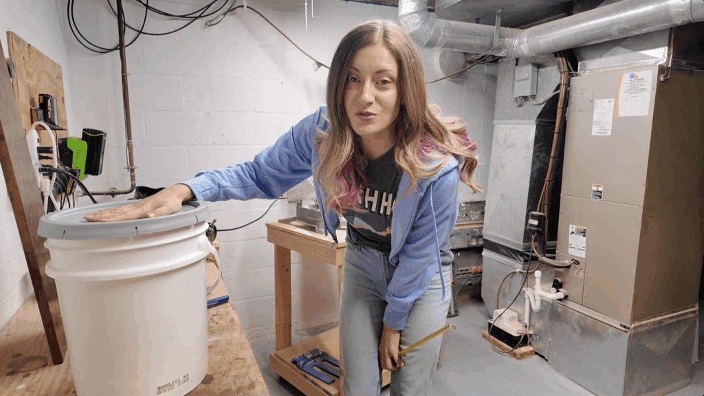 woman with a 5-gallon bucket