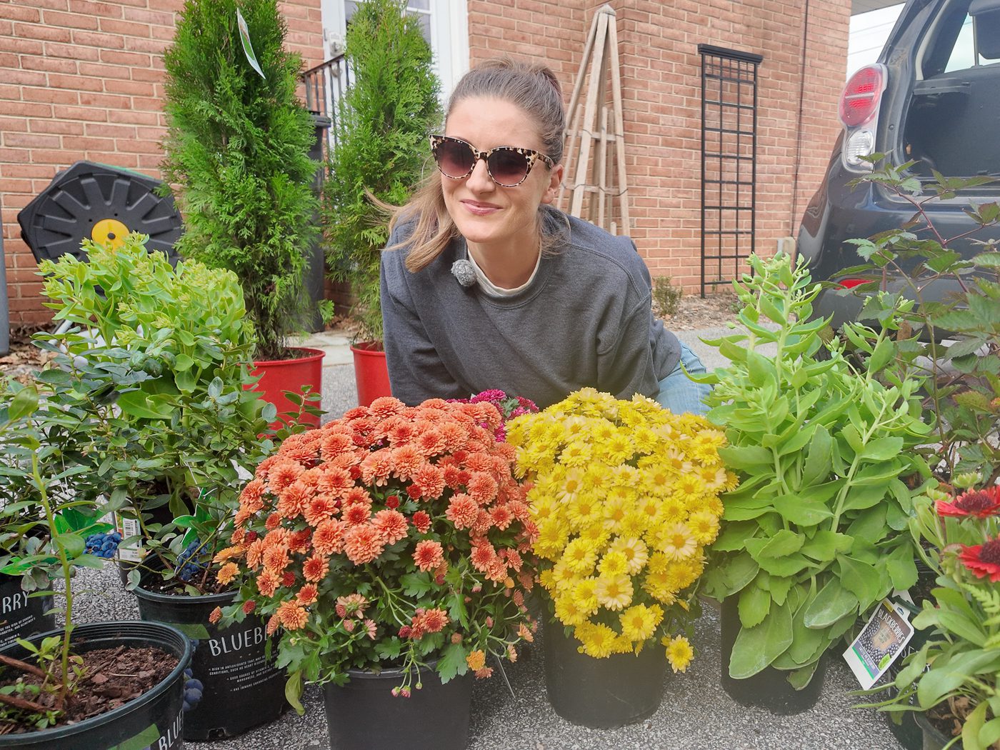 woman with potted plants