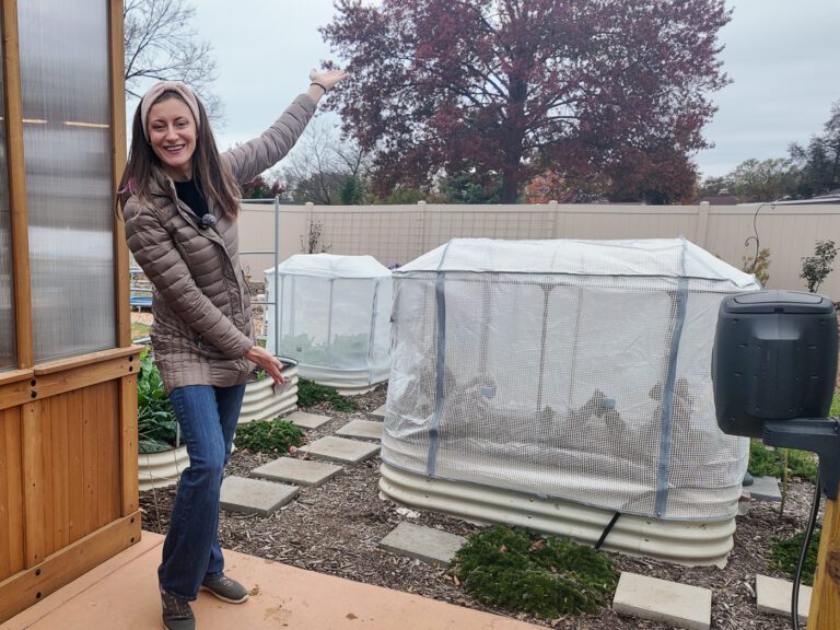 woman smiling in a garden